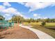 Community playground with modern equipment, providing a fun and safe recreational area for children at 1125 Fairwood Ave, Clearwater, FL 33759