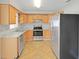 Well-equipped kitchen with stainless steel appliances and ample counter space at 1140 7Th Ne Ave, Largo, FL 33770