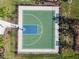 Aerial shot of the community basketball court showing the green and blue key, benches, and surrounding landscaping at 16126 Sunday Stroll Way, Odessa, FL 33556