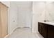 Bright bathroom featuring a shower/tub combo with white tile and a dual sink vanity at 16126 Sunday Stroll Way, Odessa, FL 33556
