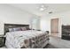 Bedroom with carpet, one window with blinds, and a ceiling fan at 16126 Sunday Stroll Way, Odessa, FL 33556
