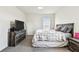 Bedroom with carpet, one window with blinds, and a ceiling fan at 16126 Sunday Stroll Way, Odessa, FL 33556