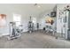 Bright community gym features modern exercise equipment and neutral colors at 16126 Sunday Stroll Way, Odessa, FL 33556