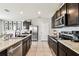 Modern kitchen featuring stainless steel appliances and granite countertops at 16126 Sunday Stroll Way, Odessa, FL 33556