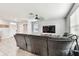 Comfortable living room featuring a large sectional sofa and ample natural light at 16126 Sunday Stroll Way, Odessa, FL 33556