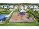 Community playground featuring modern play equipment for children with nice landscaping at 16126 Sunday Stroll Way, Odessa, FL 33556