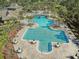 Aerial view of resort style pool with lap lanes, tables, and umbrellas. Perfect for hot Florida days! at 20115 Nob Oak Ave, Tampa, FL 33647