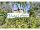 Entrance sign for the Valrico Heights community amidst lush greenery at 2108 Valrico Heights Blvd, Valrico, FL 33594