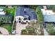 Expansive aerial view showcasing the home's full exterior, driveway, and surrounding landscaping at 2113 S West Shore Blvd, Tampa, FL 33629