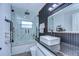 Modern bathroom with a glass-enclosed shower, sleek vanity, and stylish fixtures at 2113 S West Shore Blvd, Tampa, FL 33629
