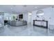 Spacious living room boasts recessed lighting, polished tile flooring, a fireplace, and stylish decor at 2113 S West Shore Blvd, Tampa, FL 33629