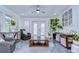 This living room has natural light, sleek floors and is neutrally decorated to be relaxing at 2113 S West Shore Blvd, Tampa, FL 33629