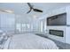 This primary bedroom offers a stone fireplace, abundant natural light, and ample closet space at 2113 S West Shore Blvd, Tampa, FL 33629