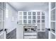 A spacious walk-in closet featuring ample storage and a center island at 2113 S West Shore Blvd, Tampa, FL 33629