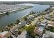 Waterfront homes line a canal, offering boating access and picturesque residential neighborhoods at 2146 Society Dr, Holiday, FL 34691