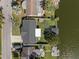 Aerial view of a waterfront home with private dock on deep canal with gulf access and no bridges at 2146 Society Dr, Holiday, FL 34691