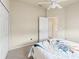 Simple bedroom with a ceiling fan, carpeted flooring, and a neutral color scheme for a peaceful retreat at 2250 Long View Cir, Brooksville, FL 34604