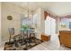 Charming breakfast nook area with views of the yard and access to the outdoor living space at 2250 Long View Cir, Brooksville, FL 34604