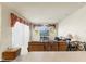 Inviting living room with plush seating, a ceiling fan, and sliding glass doors at 2250 Long View Cir, Brooksville, FL 34604