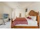 Spacious main bedroom featuring a ceiling fan and neutral carpeting at 2250 Long View Cir, Brooksville, FL 34604