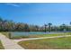 Community basketball court with multiple hoops and ample playing space, great for sports enthusiasts at 3025 Chessington Dr, Land O Lakes, FL 34638