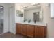 Spacious bathroom features double vanity, modern lighting, and ample cabinet space at 3025 Chessington Dr, Land O Lakes, FL 34638
