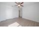 Bedroom with fan and light wood floors at 3025 Chessington Dr, Land O Lakes, FL 34638