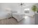 Bright bedroom with a comfortable bed, stylish decor, and natural light, creating a peaceful and inviting retreat at 3025 Chessington Dr, Land O Lakes, FL 34638