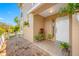 Welcoming entryway with potted plants and a white front door offering curb appeal at 3042 Branch Dr, Clearwater, FL 33760