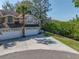 Two-story home with a two-car garage and meticulously maintained landscaping at 3042 Branch Dr, Clearwater, FL 33760