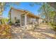 Enjoy outdoor relaxation on this paver patio complete with table and chairs at 3042 Branch Dr, Clearwater, FL 33760