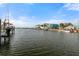 Scenic waterfront view showcasing stunning houses and boat docks along the tranquil water at 3371 Mangrove Dr, Hernando Beach, FL 34607