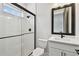Bathroom features white subway tile in glass enclosed shower and vanity with white countertop at 3404 S Omar Ave, Tampa, FL 33629