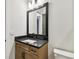 Well-lit bathroom with granite vanity at 3404 S Omar Ave, Tampa, FL 33629