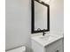 Bathroom features modern vanity with white countertop and black hardware at 3404 S Omar Ave, Tampa, FL 33629