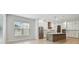 Bright kitchen features a large island, stainless appliances, and custom cabinetry at 3404 S Omar Ave, Tampa, FL 33629
