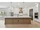 Elegant kitchen features a large island, stainless appliances, and custom cabinetry at 3404 S Omar Ave, Tampa, FL 33629