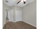 Bedroom featuring neutral walls and plush carpeting, and closet at 3622 Wiregrass Rd, New Port Richey, FL 34655