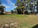 Picture of a sprawling backyard with mature trees and plenty of open space at 4216 & 4218 76Th W St, Bradenton, FL 34209