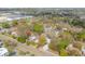 An aerial view of the property near local amenities and businesses, illustrating its prime location at 560 80Th N Ave, St Petersburg, FL 33702