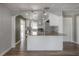 Updated kitchen with granite countertops, stainless appliances, and breakfast bar seating at 560 80Th N Ave, St Petersburg, FL 33702