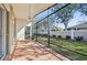 A screened-in patio and ceiling fan allows for outdoor enjoyment while shading from the sun at 6431 43Rd E Ct, Sarasota, FL 34243