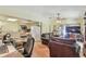 Open-concept living room and kitchen area, ideal for entertaining and Gathering gatherings at 8510 Lays Cove Pl, Odessa, FL 33556