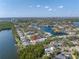 Aerial view of lovely waterfront townhome community on a sunny day at 1074 Sanabel Ne Ct, St Petersburg, FL 33702