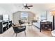 Bonus room featuring a daybed, seating area and ceiling fan at 12906 Tar Flower Dr, Tampa, FL 33626