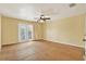 Spacious bedroom with natural light from the french doors to the balcony at 172 E Davis Blvd, Tampa, FL 33606