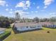 Charming single-story home featuring a well-maintained lawn and classic design at 1730 Sunset Point Rd, Clearwater, FL 33755