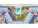 Aerial view of condo community and swimming pool, located directly on the beach at 18304 Gulf Blvd # 217, Redington Shores, FL 33708
