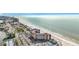 Picturesque aerial view of condo with beach access and shimmering Gulf waters in a desirable Florida location at 18304 Gulf Blvd # 217, Redington Shores, FL 33708