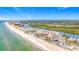 Attractive aerial view of a condo community located alongside the Gulf with lovely ocean and beach access at 18304 Gulf Blvd # 217, Redington Shores, FL 33708